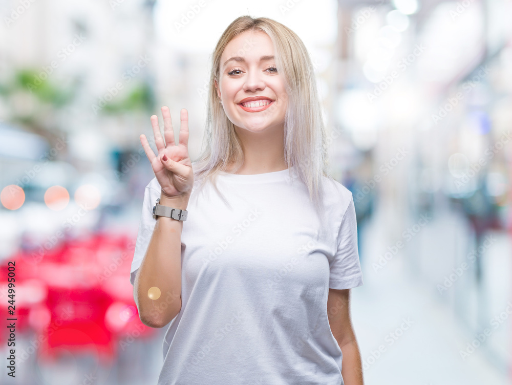 Young blonde woman over isolated background showing and pointing up with fingers number four while smiling confident and happy.