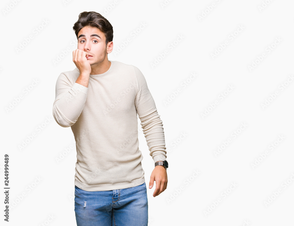 Young handsome man over isolated background looking stressed and nervous with hands on mouth biting nails. Anxiety problem. Young handsome man over isolated background looking stressed and nervous with hands on mouth biting nails. Anxiety problem.