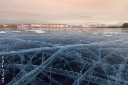 Baikal in the winter. Ice expanses at sunset. Russia, Siberia