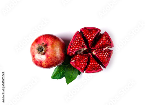 Pomegranate red fruit on white background, top view