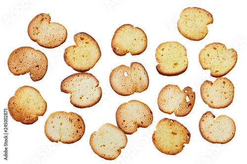 Toasted bread (Italian bruschetta toasts) isolated on white background, Top view. Slices of toasted baguette