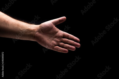 Isolated men hand with black background
