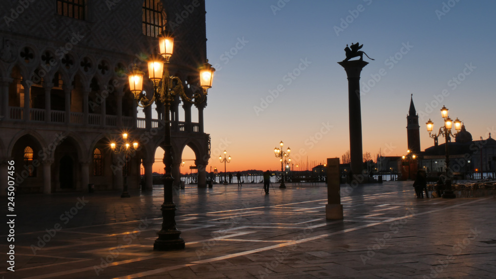 Fototapeta premium Venice Saint Marco Square Romantic View at Sunrise with nobody and Golden Sun Light