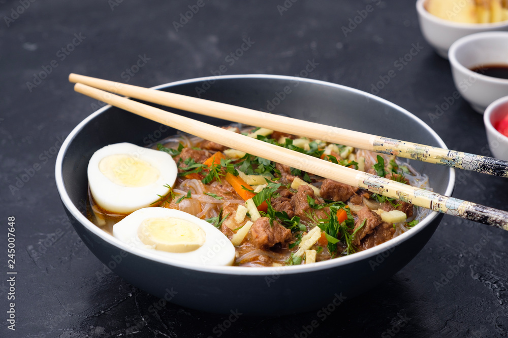 Home food Asia, Vietnam, egg noodle soup, colorful food ingredient for this food such as egg, beef, broth, ginger, soy sauce, carrot, vegetable Home food Asia, Vietnam, egg noodle soup, colorful food ingredient for this food such as egg, beef, broth, ginger, soy sauce, carrot, vegetable