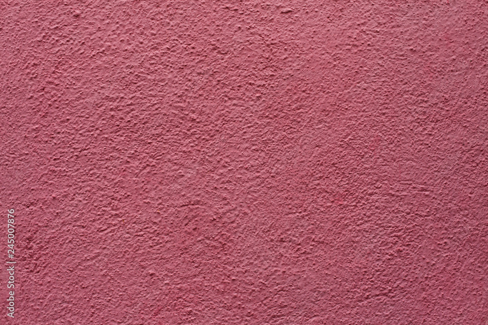 Dirty pink painted stucco wall. Background texture. Dirty pink painted stucco wall. Background texture.