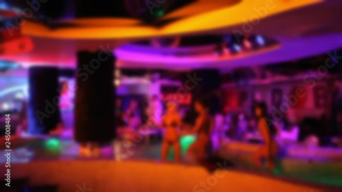 Beautiful sexy girls dancing in night club in lingerie..Out of focus