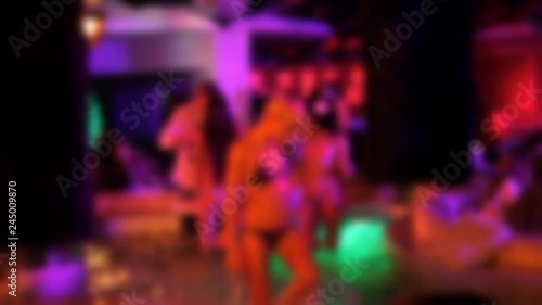 Beautiful sexy girls dancing in night club in lingerie..Out of focus