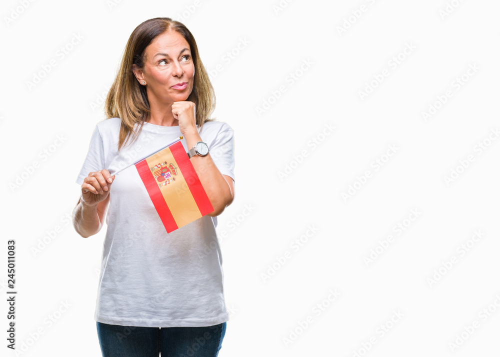 Middle age hispanic woman holding flag of Spain over isolated background serious face thinking about question, very confused idea Middle age hispanic woman holding flag of Spain over isolated background serious face thinking about question, very confused idea