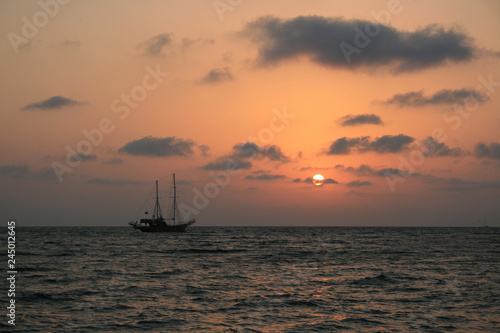 ship at sea at sunset © Анастасия Казурова