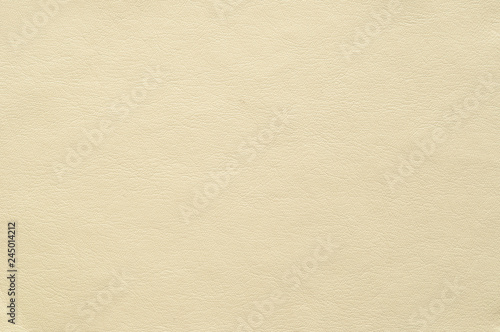 Color light ivory faux leather with a fine texture. photo