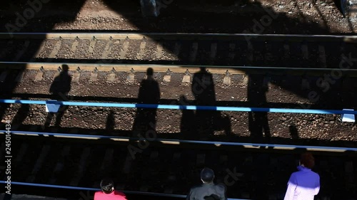 shadows of people at the station