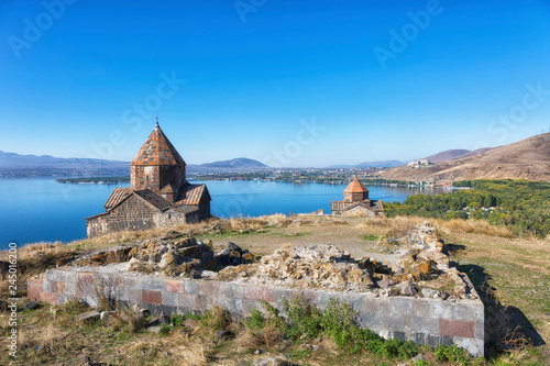 Scenic view of an old Sevanavank church in Sevan, Armenia on sunny day, blue sky