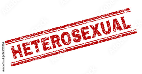 HETEROSEXUAL seal print with distress texture. Red vector rubber print of HETEROSEXUAL text with dirty texture. Text tag is placed between double parallel lines.