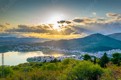 Sunset over kastoria, Greece photo