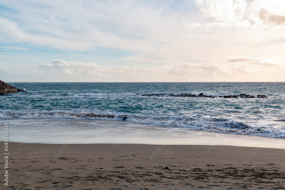 Front view of ocean black sand beach Tenerife