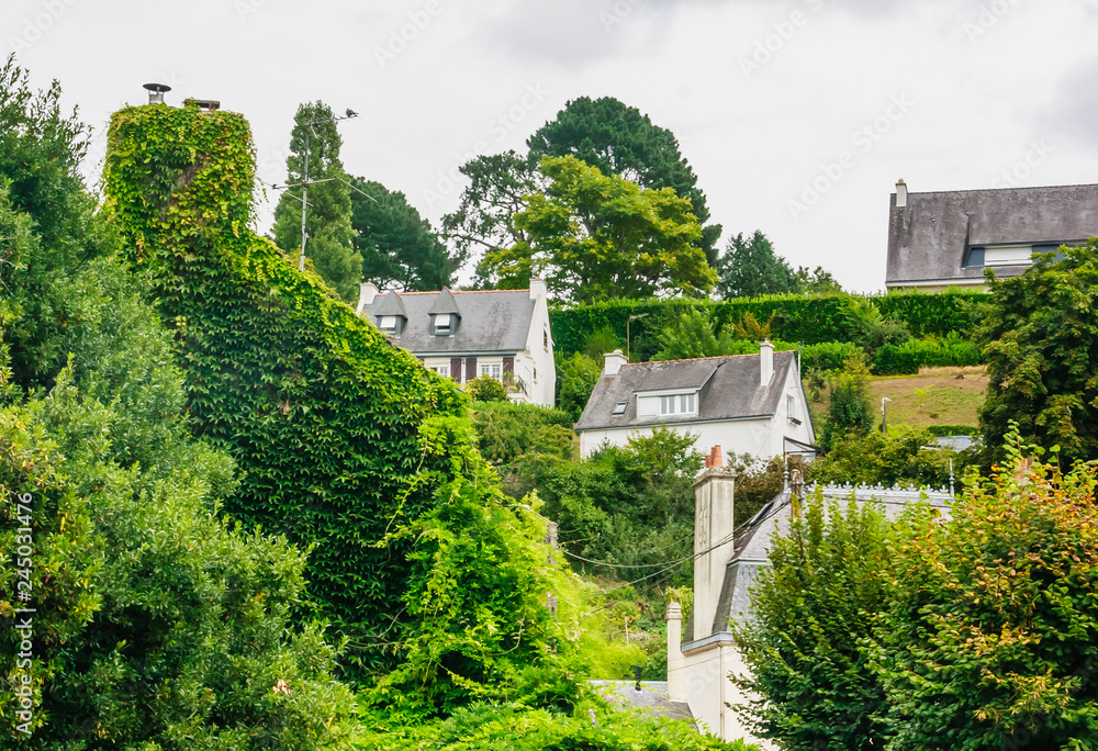 Obraz premium View of Quimperle (Kemperle), a historic town built around two rivers, the Isole and Elle rivers that combine to form the Laita river, in Finistere, Brittany, France
