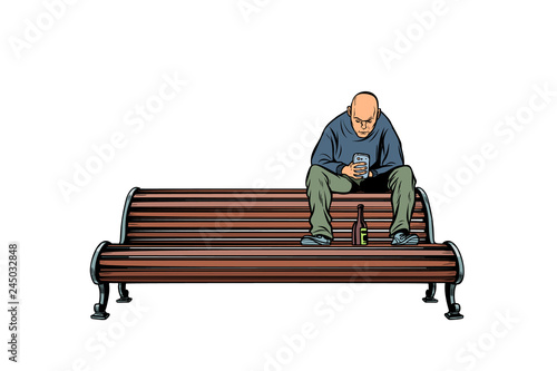 skinhead bully sitting on a bench with a bottle