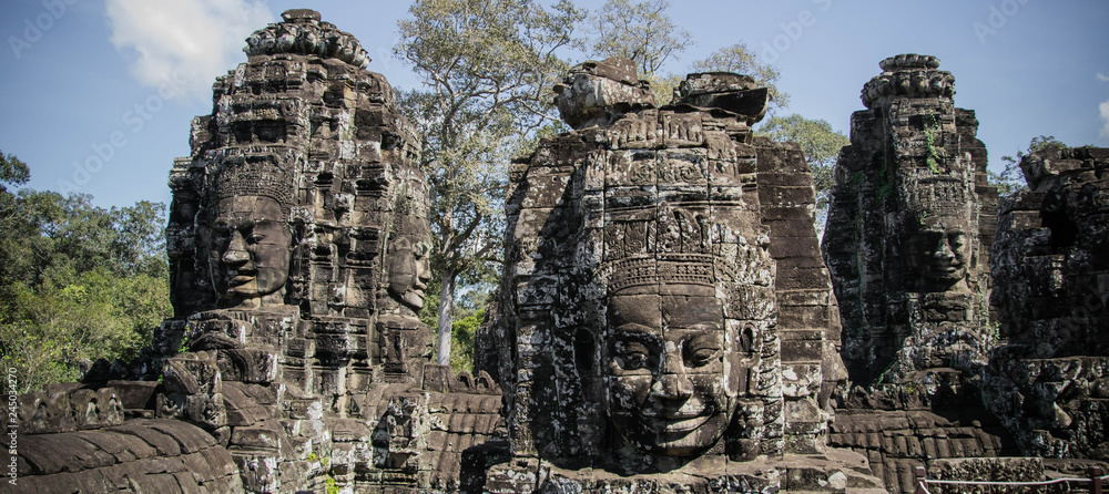 angkor wat cambodia face statues