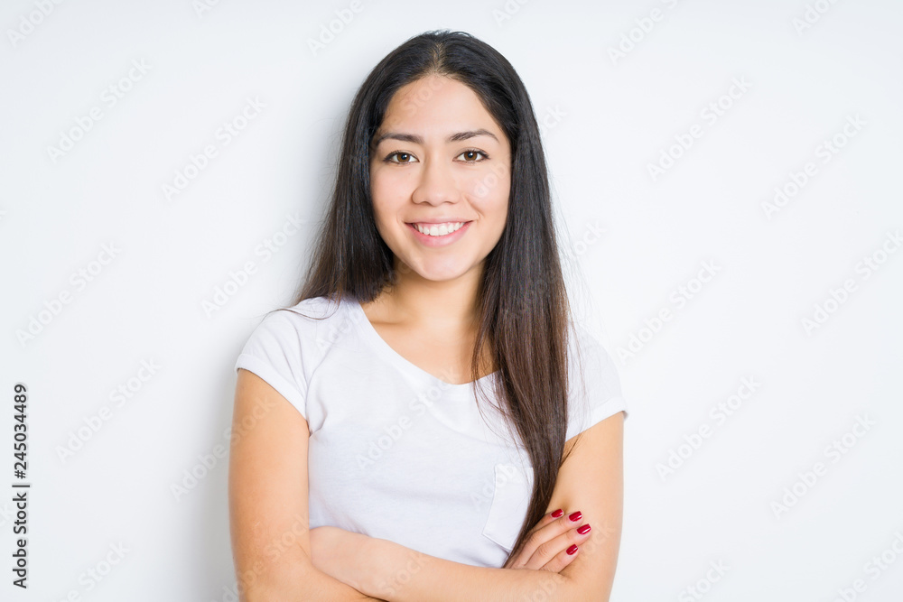 Beautiful brunette woman over isolated background happy face smiling with crossed arms looking at the camera. Positive person. Beautiful brunette woman over isolated background happy face smiling with crossed arms looking at the camera. Positive person.