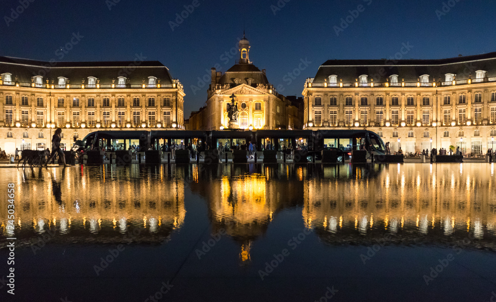 Tram stoped at  place de la bourse in downtown  Bordeaux at night