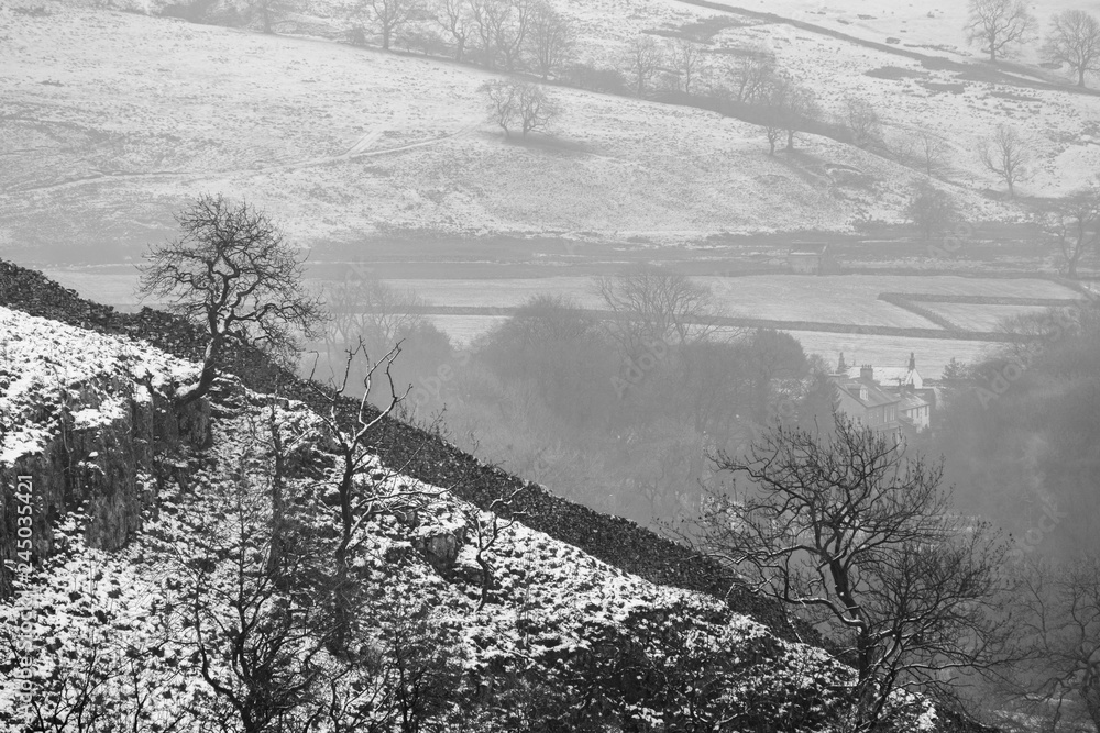 Clear slope over misty Malham