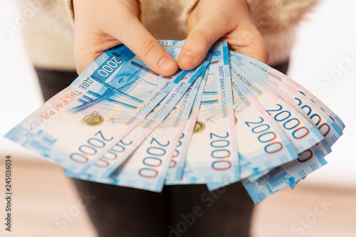 2000 Russian bills in hand