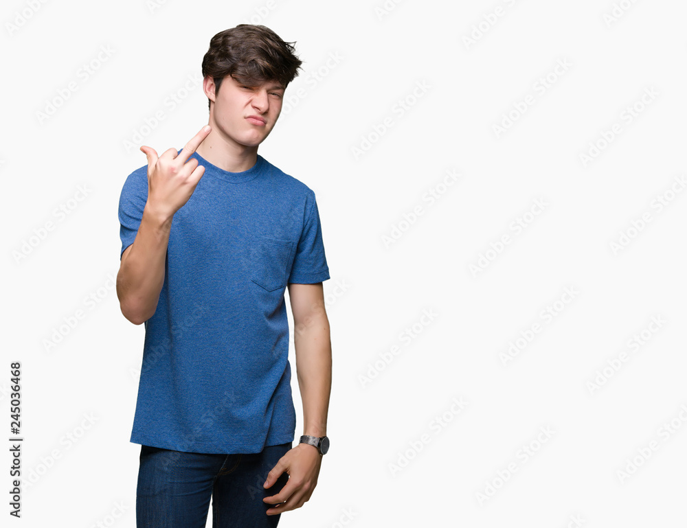 Young handsome man wearing blue t-shirt over isolated background Showing middle finger, impolite and rude fuck off expression Young handsome man wearing blue t-shirt over isolated background Showing middle finger, impolite and rude fuck off expression