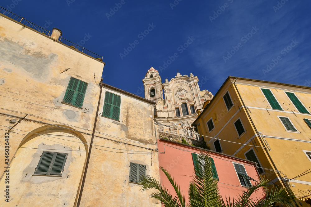 View of the medieval village of Cervo Ligure, elected as one of the most beautiful borough in Italy, with St John the Baptist church also called 