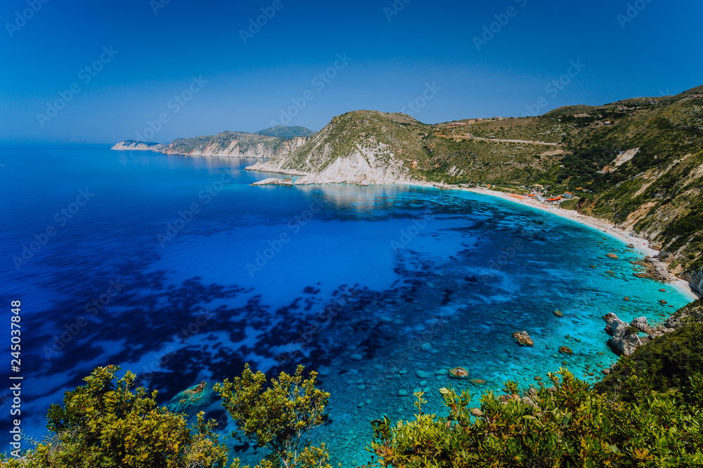 Amazing water colors of Petani beach, Kefalonia, Greece Ionian islands. Summer adventure vacation holiday luxury travel romantic honeymooning concept. Must see place