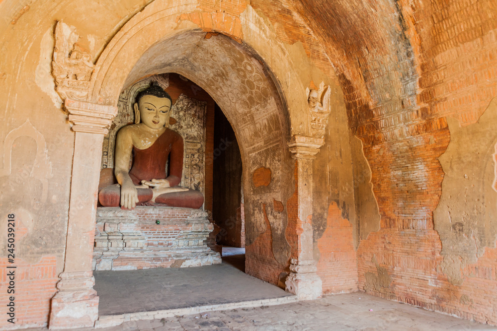 Buddha statues in Dhammayangyi temple in Bagan, Myanmar