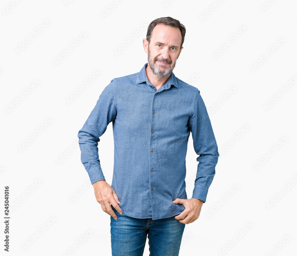 Handsome middle age elegant senior man over isolated background Relaxed with serious expression on face. Simple and natural looking at the camera. Handsome middle age elegant senior man over isolated background Relaxed with serious expression on face. Simple and natural looking at the camera.