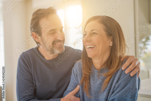 Romantic middle age couple in love at home