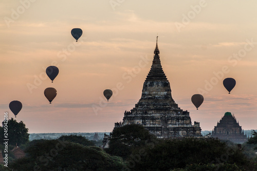 Balloons over Bagan and the skyline of its temples, Myanmar. Sulamani temple and Shwesandaw pagoda. © Matyas Rehak
