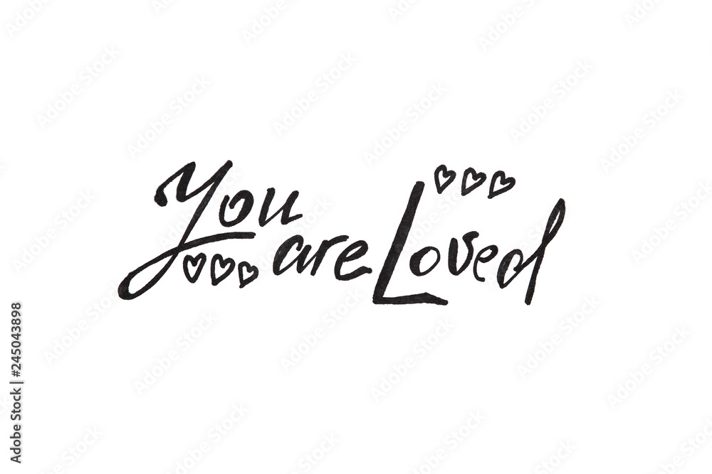 You are loved - calligraphy painted text isolated on white background, religion and feelings concept