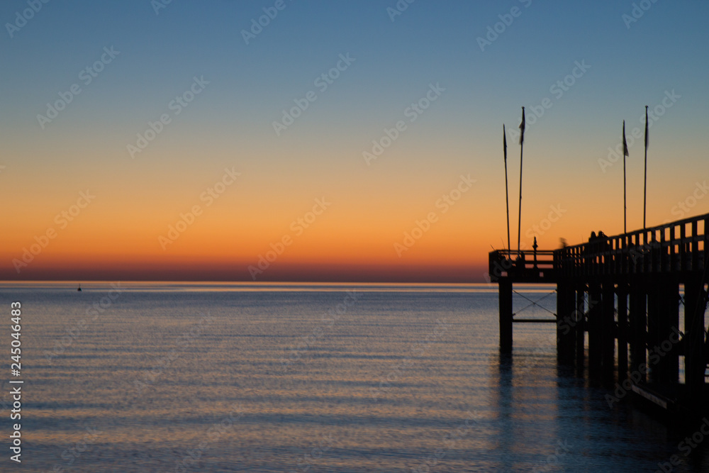 pier at weissenhauser strand in Germany pier at weissenhauser strand in Germany