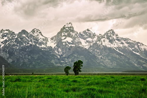 The Tetons on a cloudy day by Skip Weeks