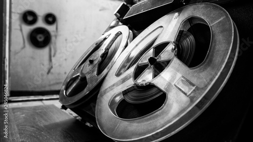 Canvas-taulu Vintage tape recorder is playing music, close up