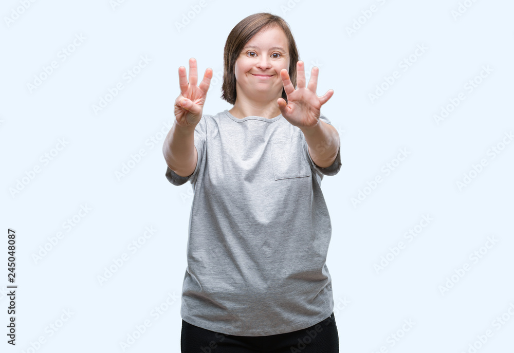 Young adult woman with down syndrome over isolated background showing and pointing up with fingers number eight while smiling confident and happy. Young adult woman with down syndrome over isolated background showing and pointing up with fingers number eight while smiling confident and happy.