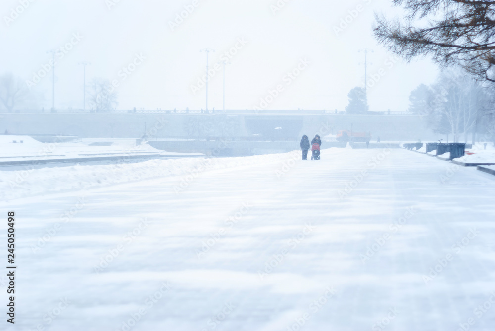 cityscape during a snowfall