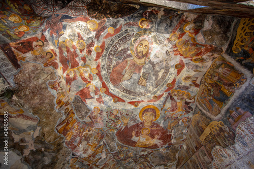 Macka, Trabzon, Turkey - August 3, 2014; Sumela monastery courtyard under the rock. Remains of old fresco are seen on several walls.Macka, Trabzon, Turkey. photo