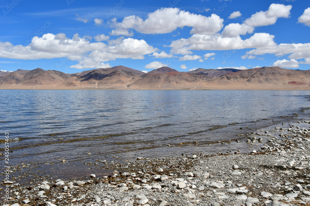 China, Tibet. High-mountain lake Tarok in summer China, Tibet. High-mountain lake Tarok in summer