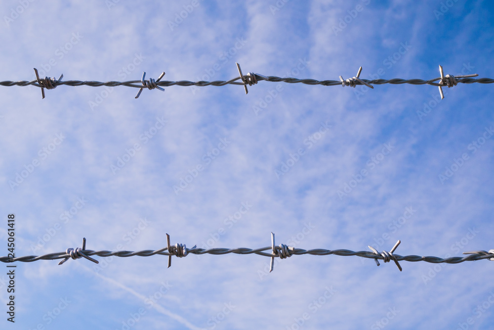 Barbed wire with sky Barbed wire with sky