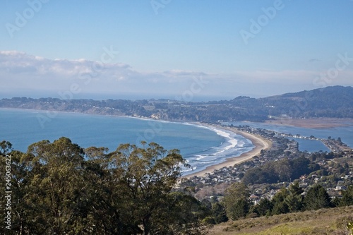 Bolinas Bay and beach on the north coast of California approxamitely 15 miles from San Fransico. typical haze from teh marine layer is on slight today.