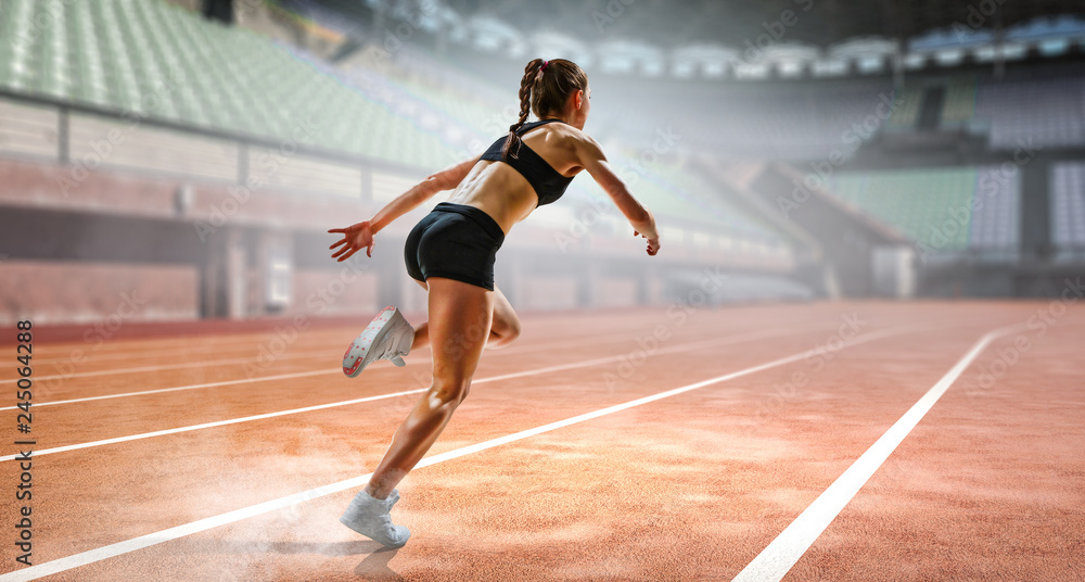 Obraz premium Sportswoman running race. Mixed media
