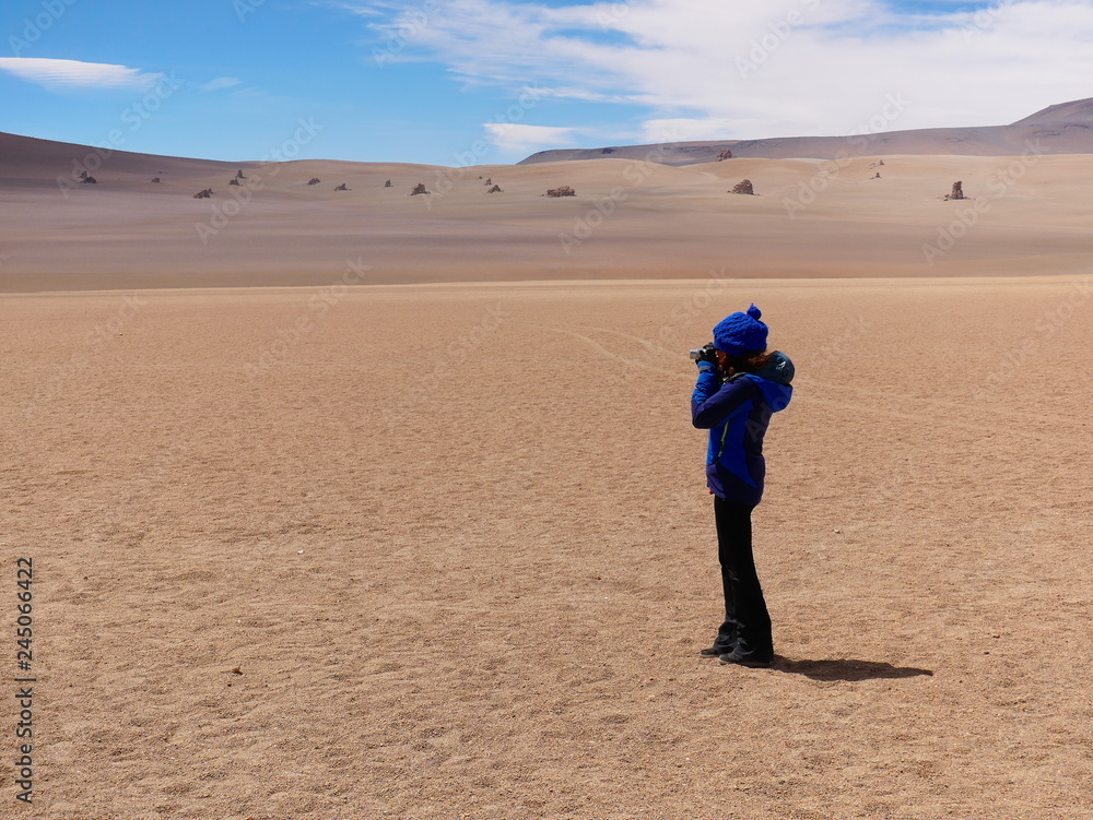 Tourist in the high altitude desert, Bolivia
