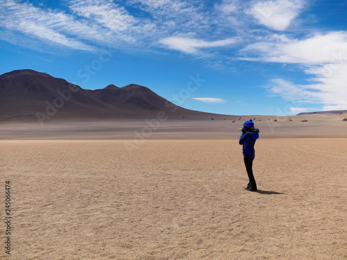 Tourist in the high altitude desert  Bolivia