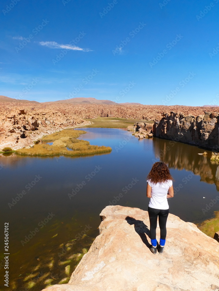 Tourist at Laguna escondida in Sur Lipez, Bolivia