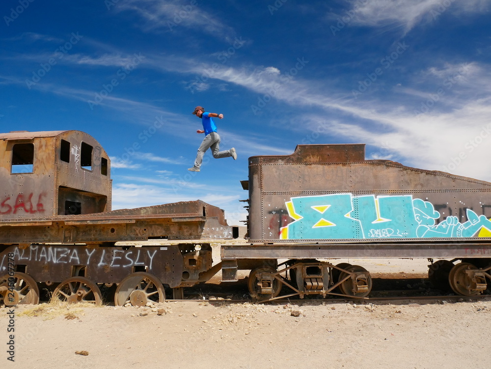 Jumping the train. Train cemetary near Uyuni, Bolovia