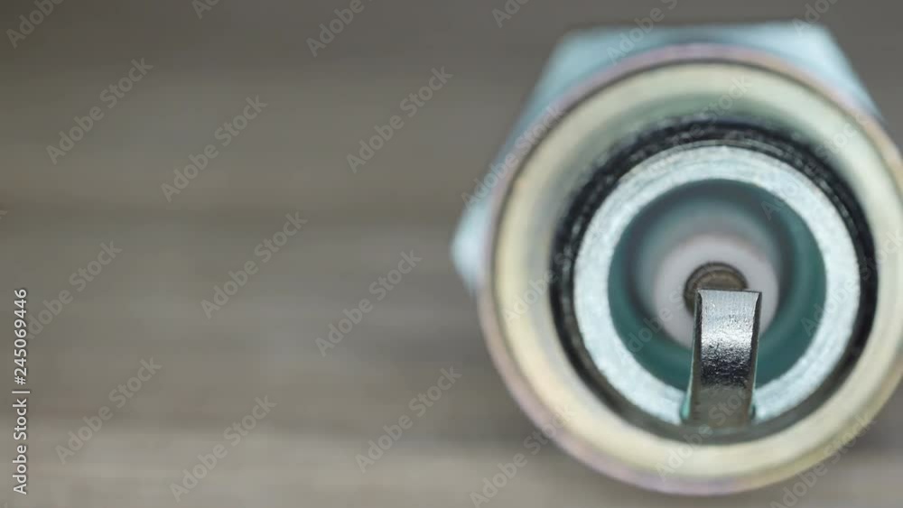 22032_Top_view_of_the_macro_shot_of_the_sparkplug.mov 22032_Top_view_of_the_macro_shot_of_the_sparkplug.mov