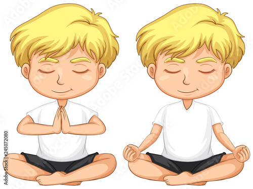 Young blond boy meditating
